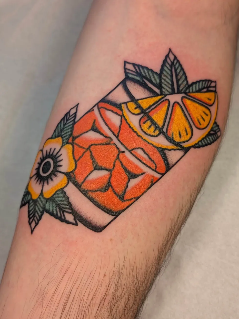 Oranges sanguines — tatouage traditionnel réalisé par Paul Northe (T.02)